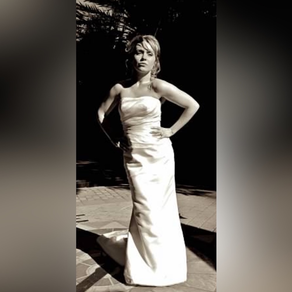 Beautiful classic timeless wedding gown for sale.